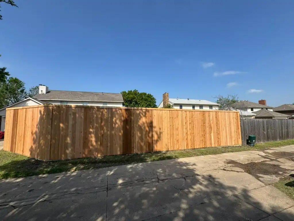 Eight-foot cedar privacy fence between close-set homes