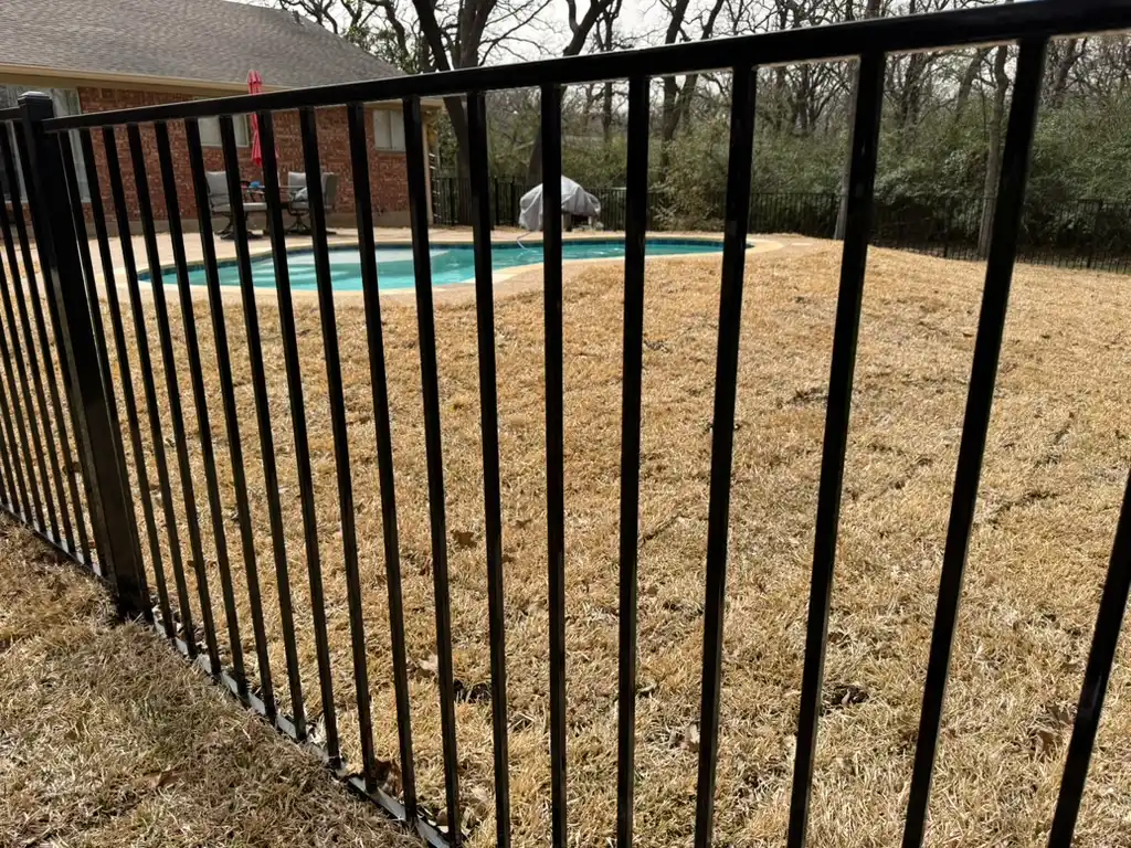 Ornamental pool fence with code-compliant gate