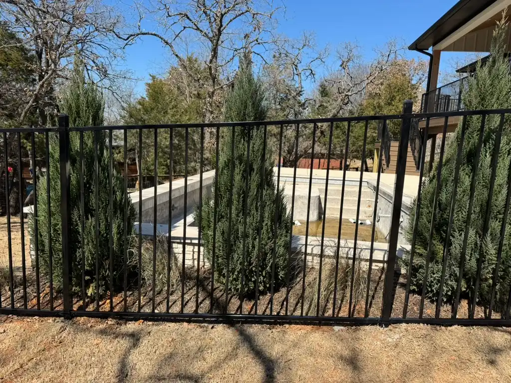 Hand-welded ornamental steel fence